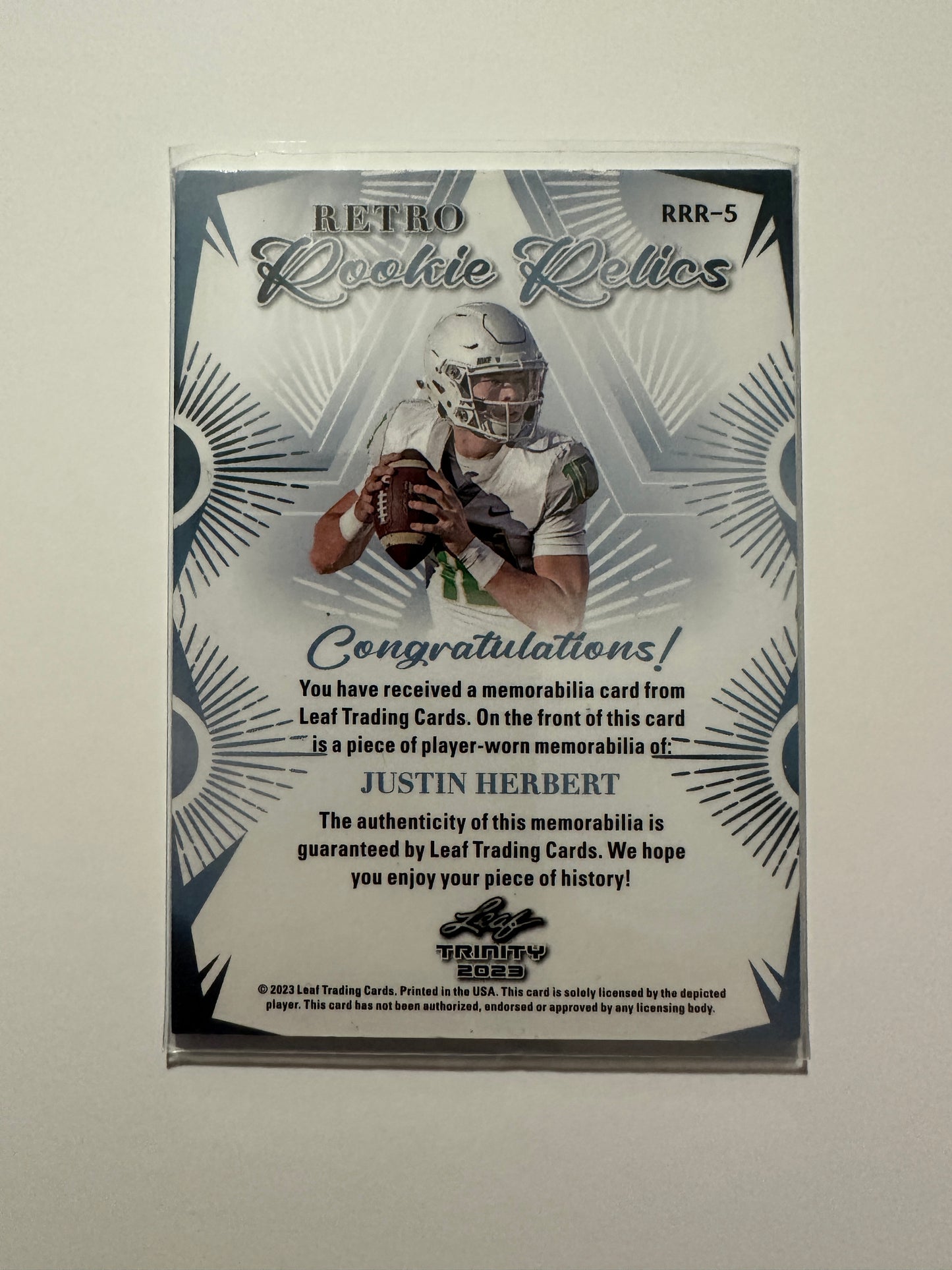 Justin Herbert #RRR-5 Retro Rookie Relics Player Worn Patch (2023 Leaf Trinity)