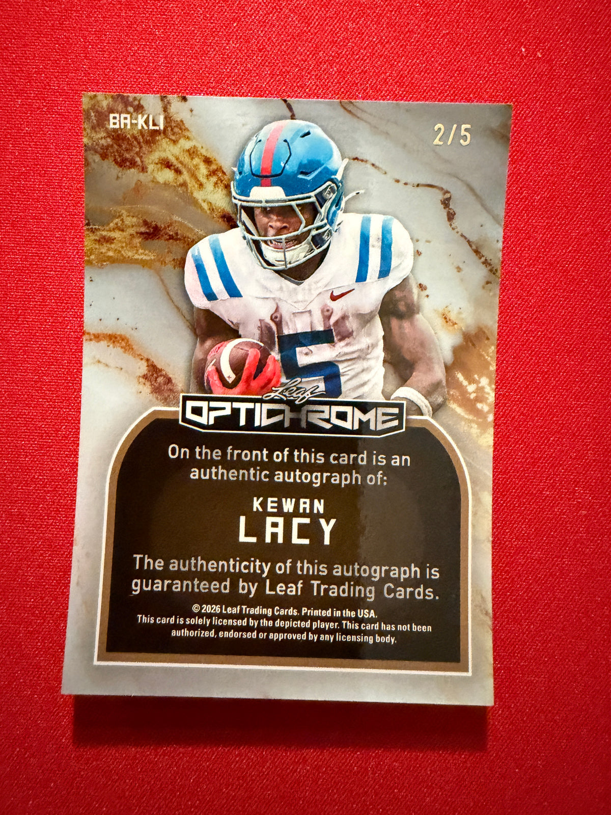 Kewan Lacy 2026 Leaf Optichrome Football Base Auto Snow Day /5