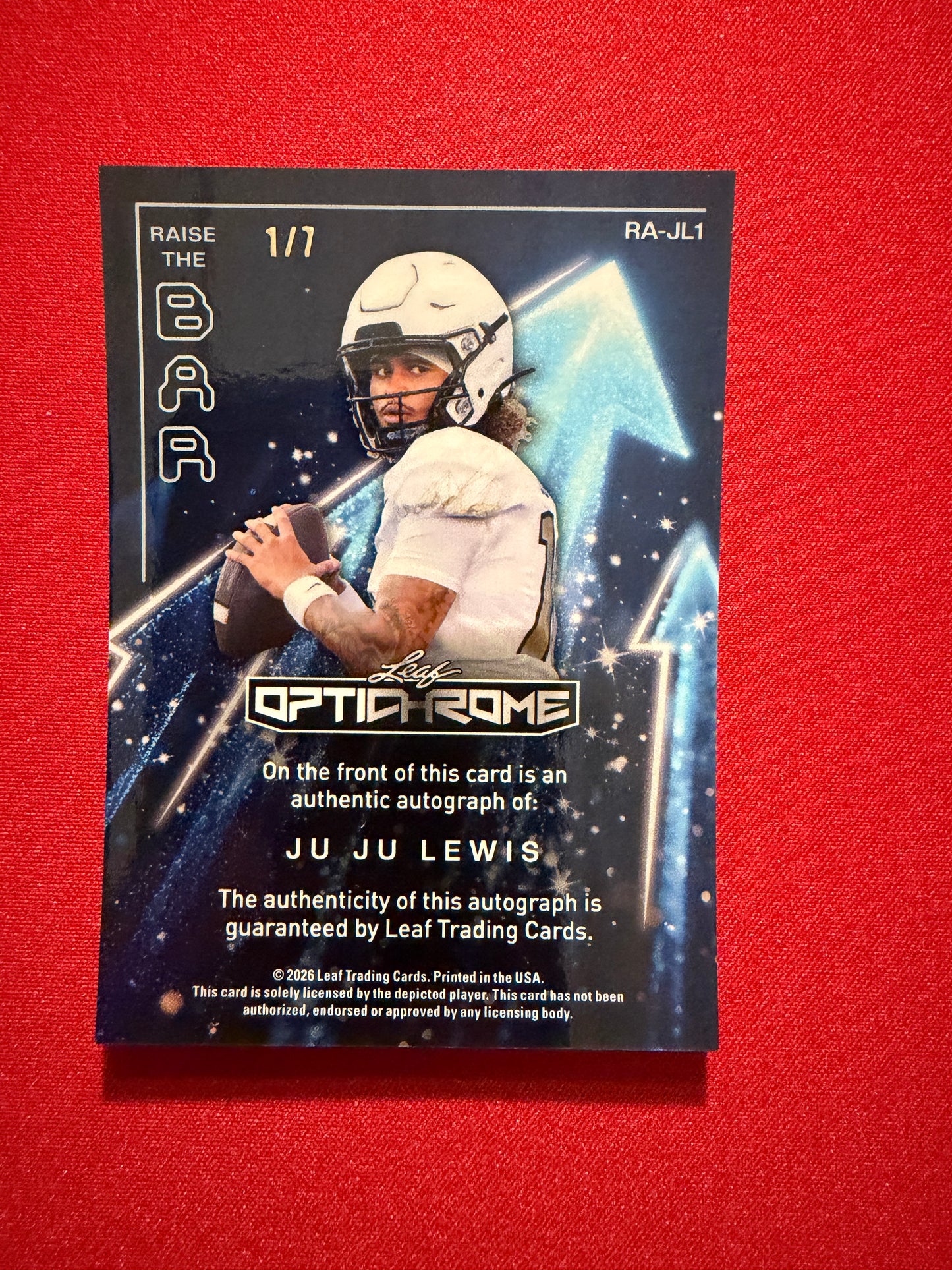 Juju Lewis 2026 Leaf Optichrome Football Auto Raise the Bar Purple Crystal 1/7