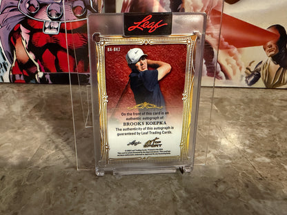 2026 Leaf Art of Sport Brooks Koepka Base Auto Platinum /7