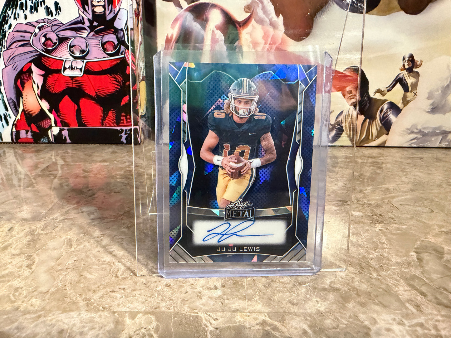 Juju Lewis 2026 Leaf Trinity Football Metal Auto Blue Crystal /30