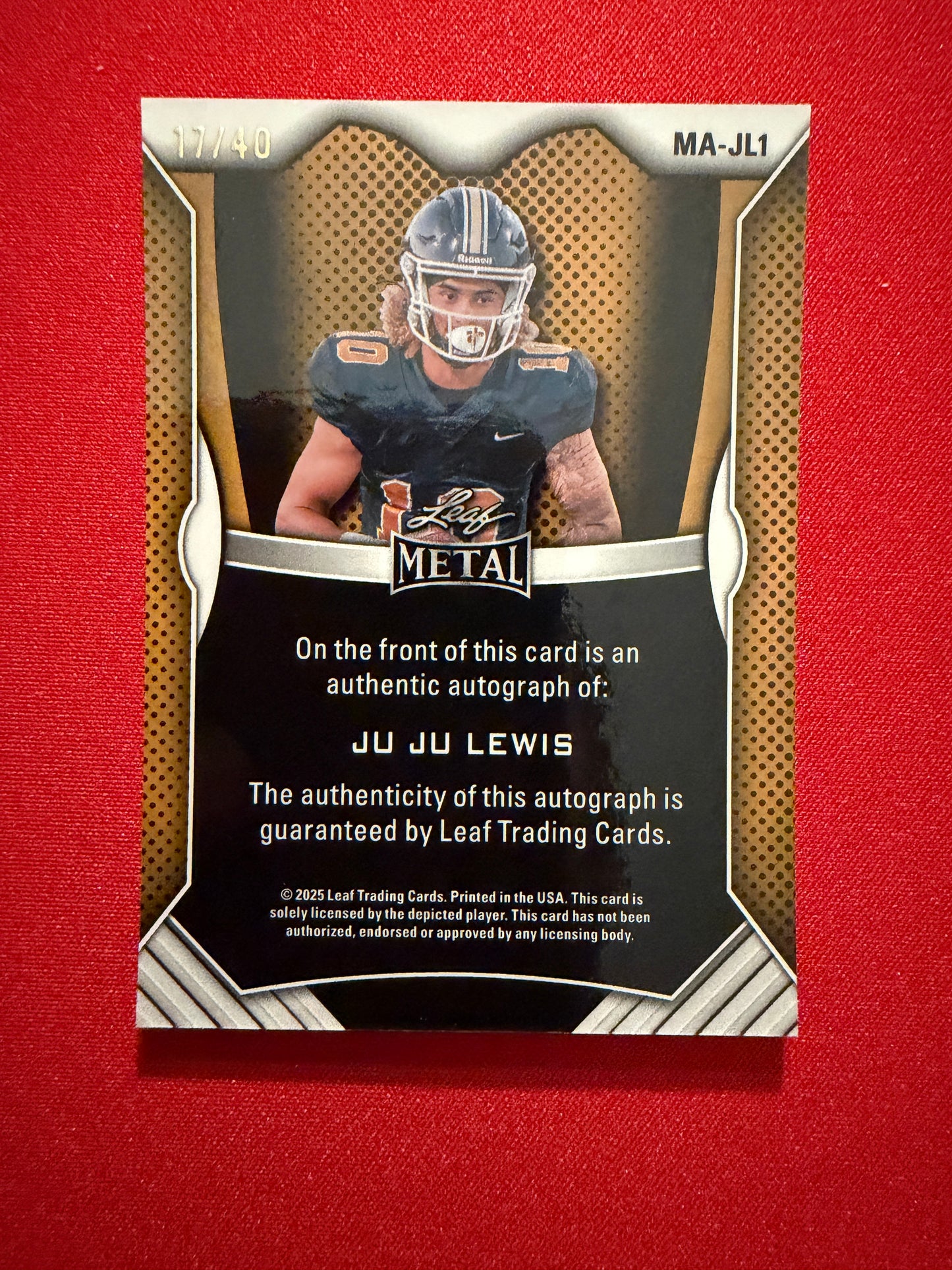 Juju Lewis 2026 Leaf Trinity Football Metal Auto Orange Crystal /40