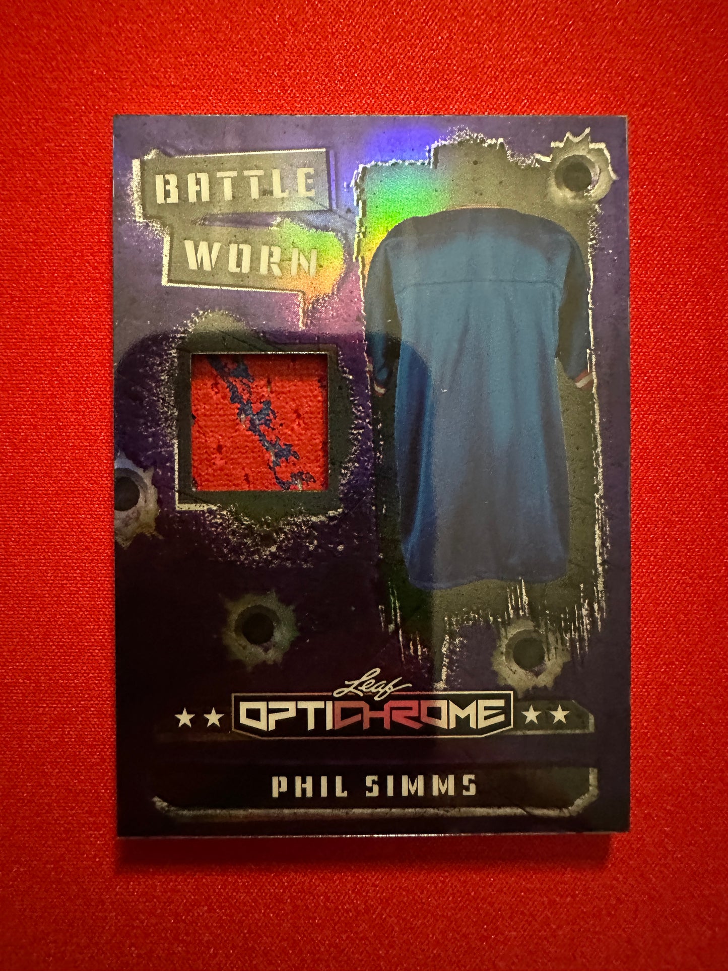Phil Simms 2026 Leaf Optichrome Battle Worn Purple Prismatic Game-Used Patch /7