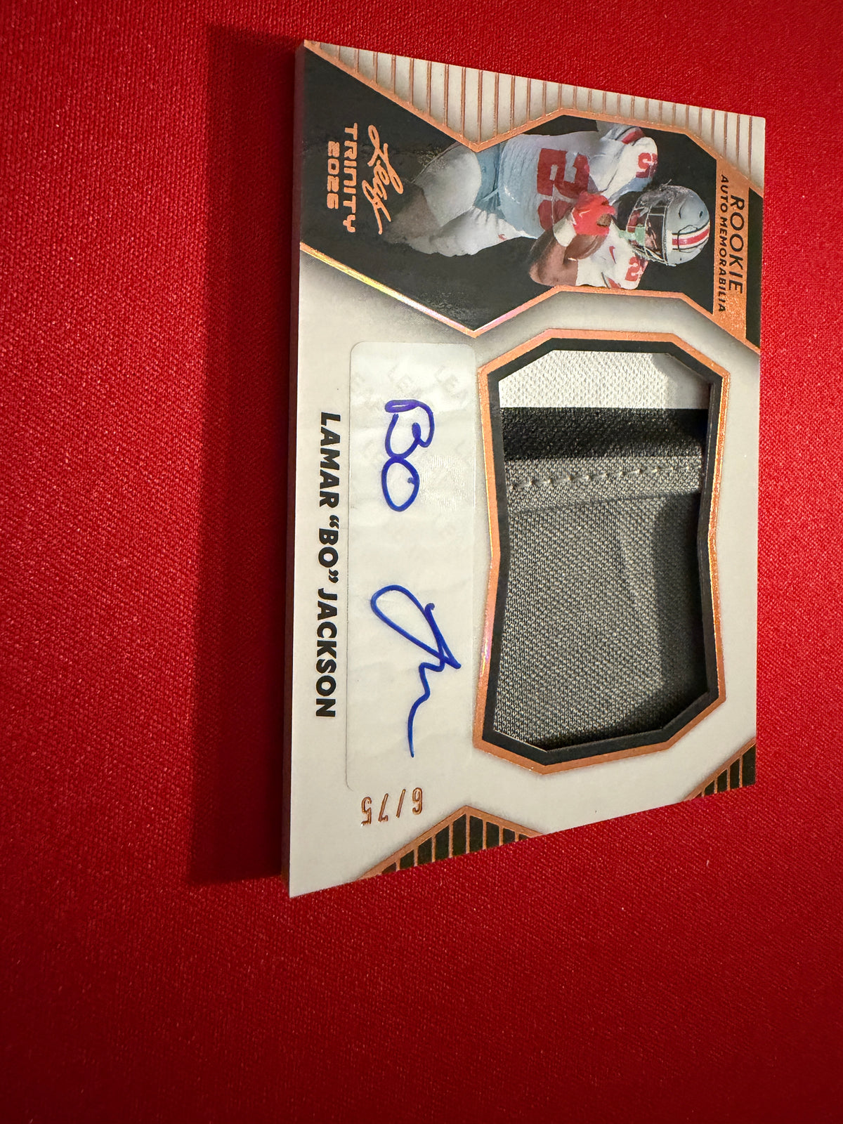 Lamar "Bo" Jackson 2026 Leaf Trinity Rookie Auto Memo Multicolor Patch /75