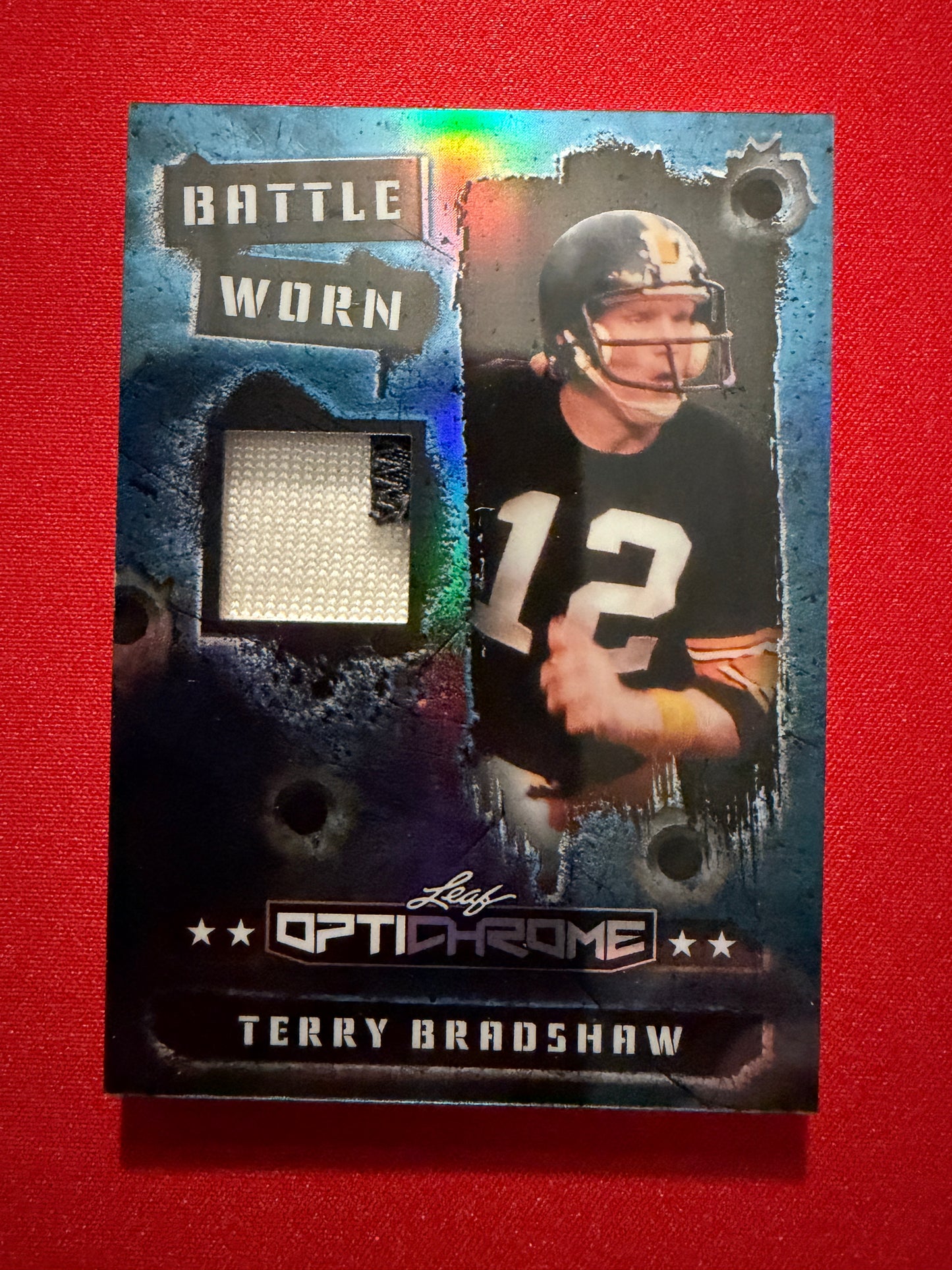 2026 Leaf Optichrome Terry Bradshaw Battle Worn Platinum Multicolor Game-Used /8