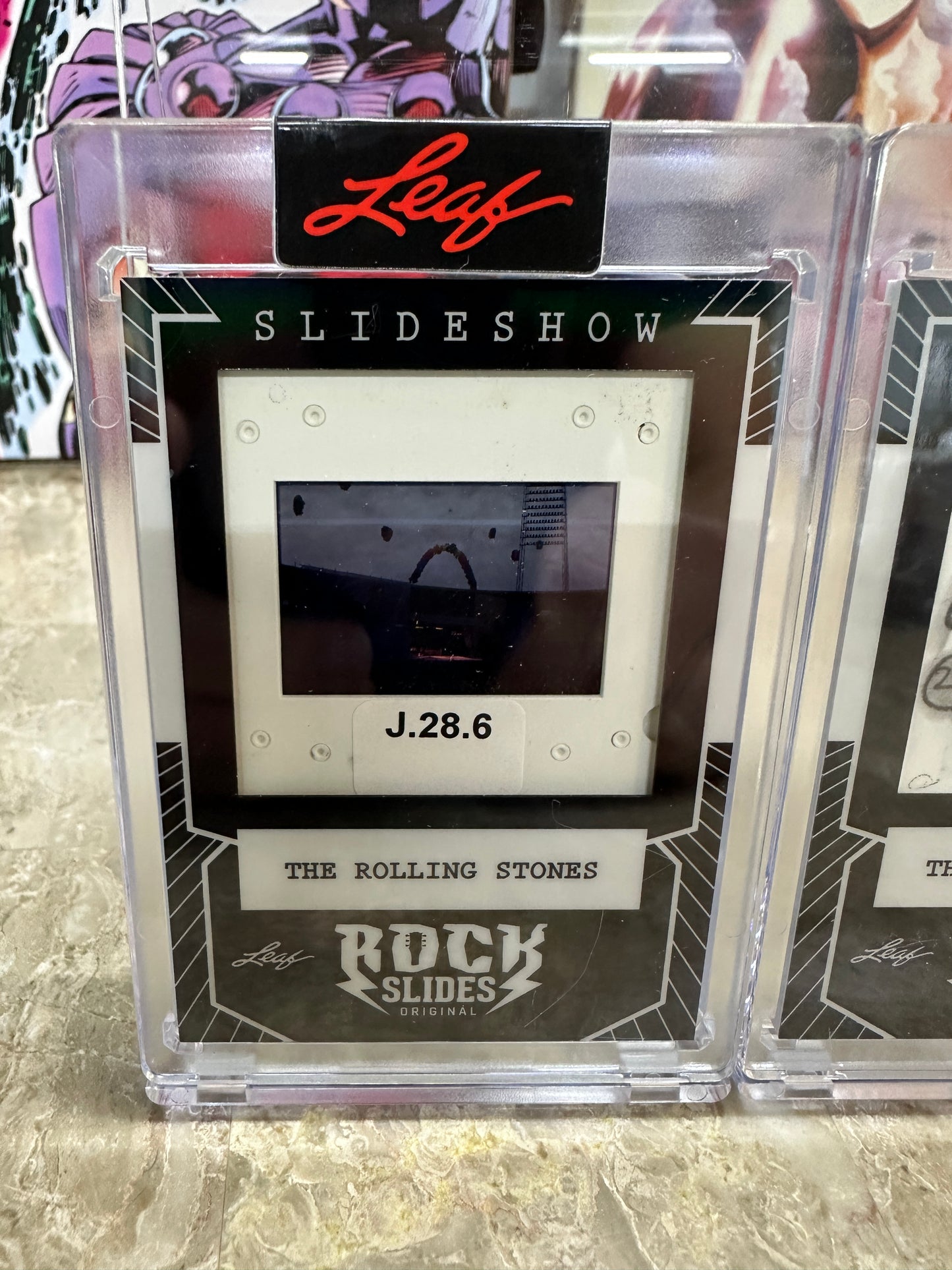 2026 Leaf Slideshow Original Rolling Stones 3 Encased Rock Slides - Action Shot