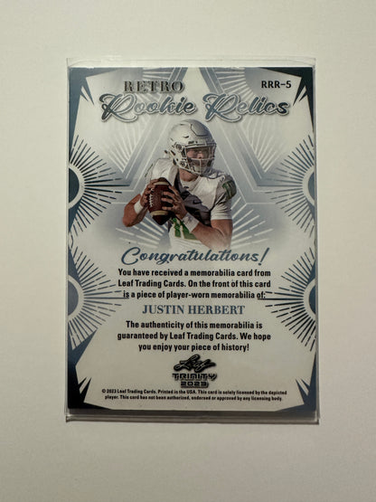 Justin Herbert #RRR-5 Retro Rookie Relics Player Worn Patch (2023 Leaf Trinity)