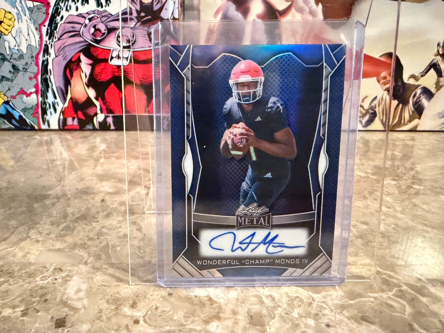 Wonderful “Champ” Monds 2026 Leaf Trinity Football Metal On-Card Blue 1/6 Bookend