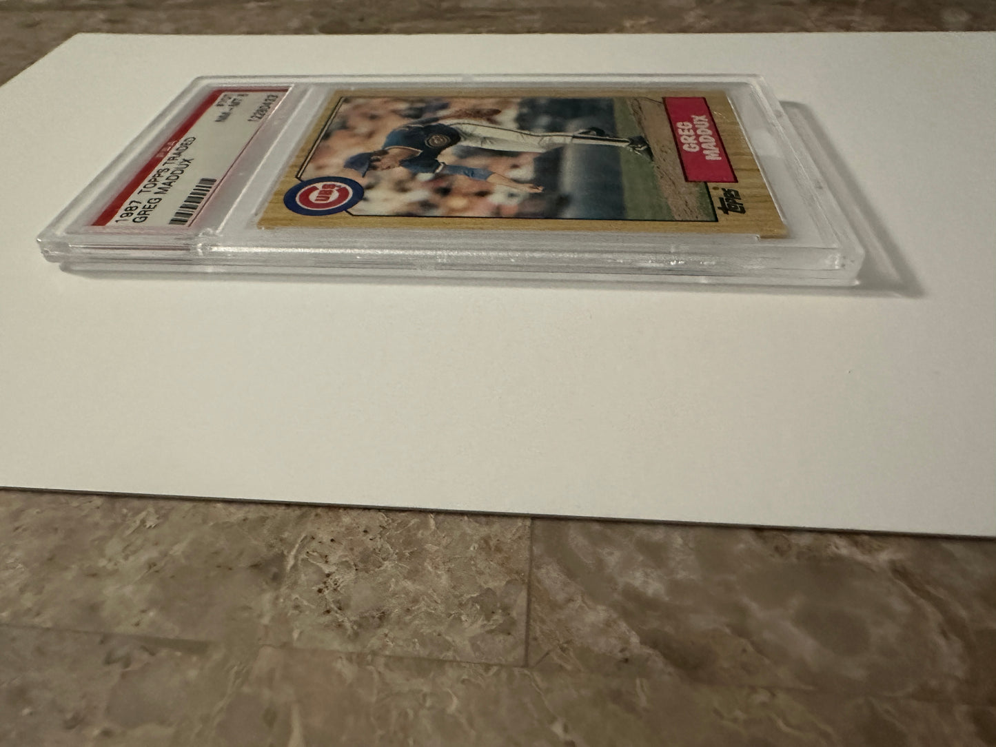 Greg Maddux #7OT PSA Graded NM-MT 8 (1987 Topps Traded)