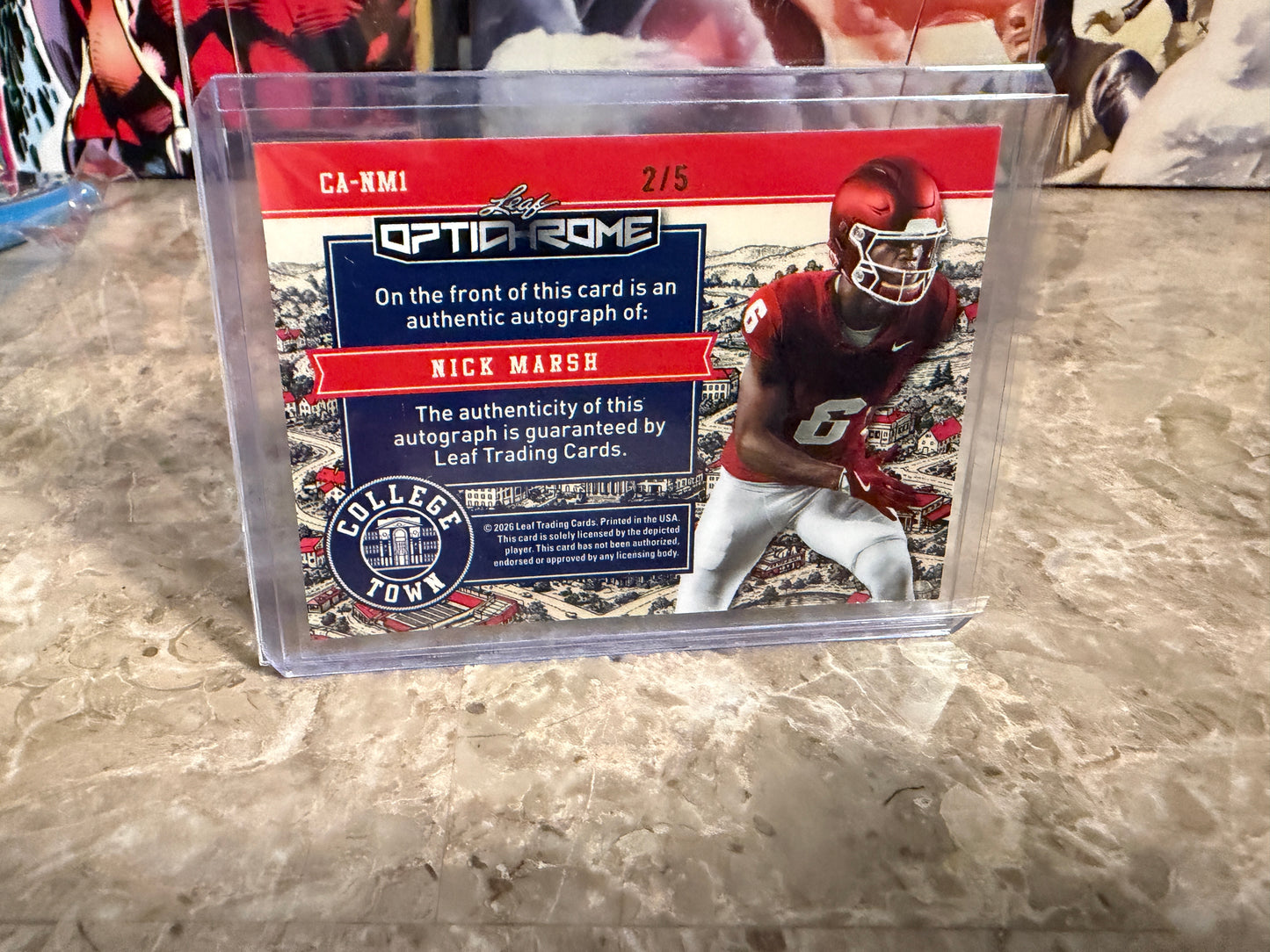 Nick Marsh 2026 Leaf Optichrome Football College Town Blue Prismatic /5