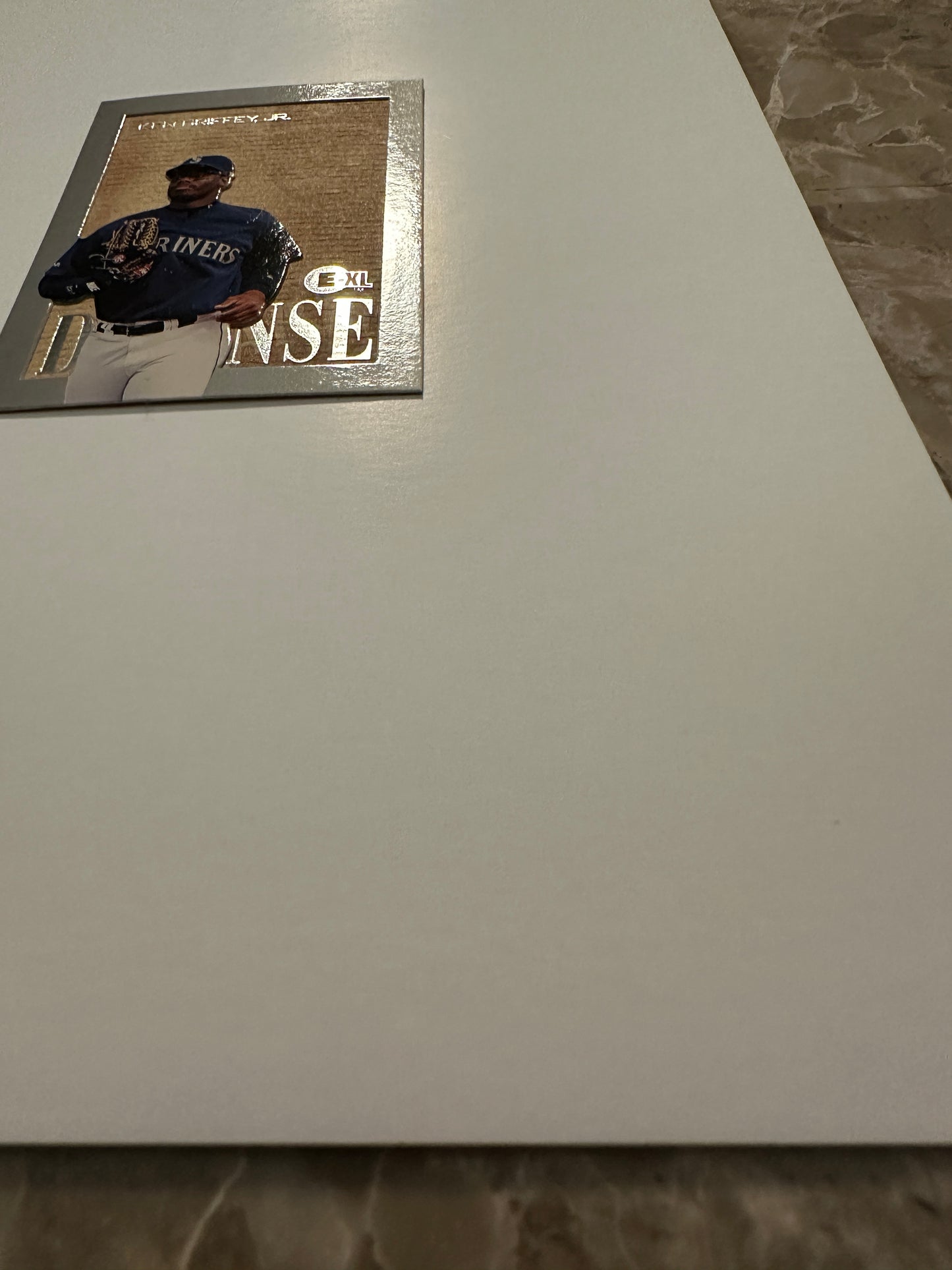 Ken Griffey Jr. #4 (1996 Fleer E-Motion XL D-Fense) - High grade