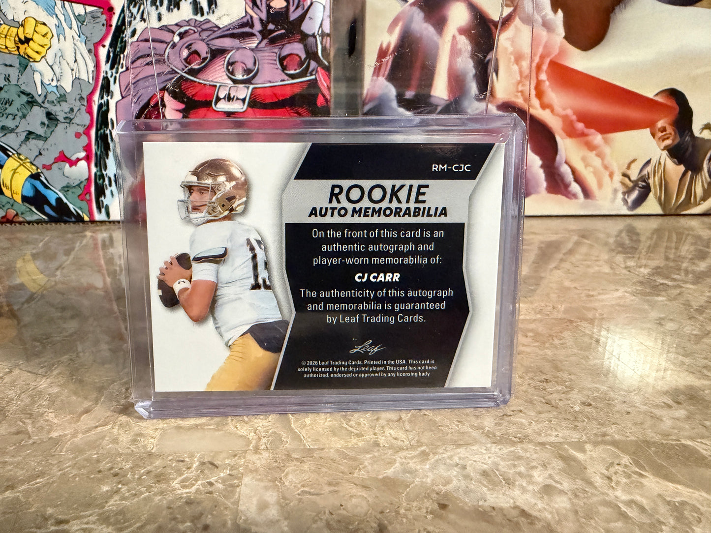 CJ Carr 2026 Leaf Trinity Rookie Auto Mem Black Gold Under Armor Logo Patch 1/1
