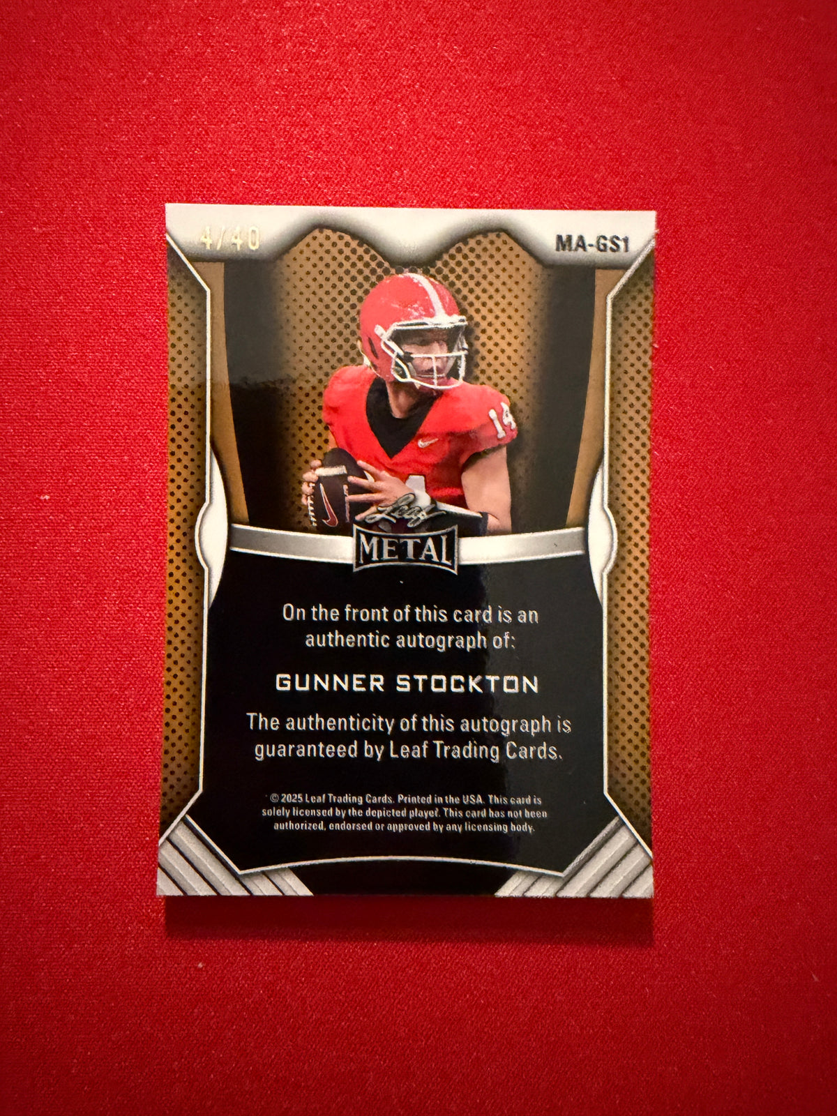 Gunner Stockton 2026 Leaf Trinity Football Metal Auto Orange Shimmer /40