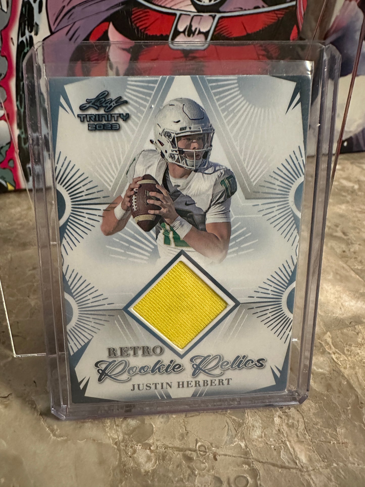 Justin Herbert #RRR-5 Retro Rookie Relics Player Worn Patch (2023 Leaf Trinity)