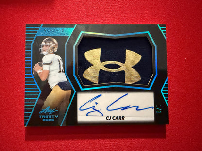 CJ Carr 2026 Leaf Trinity Rookie Auto Mem Black Gold Under Armor Logo Patch 1/1